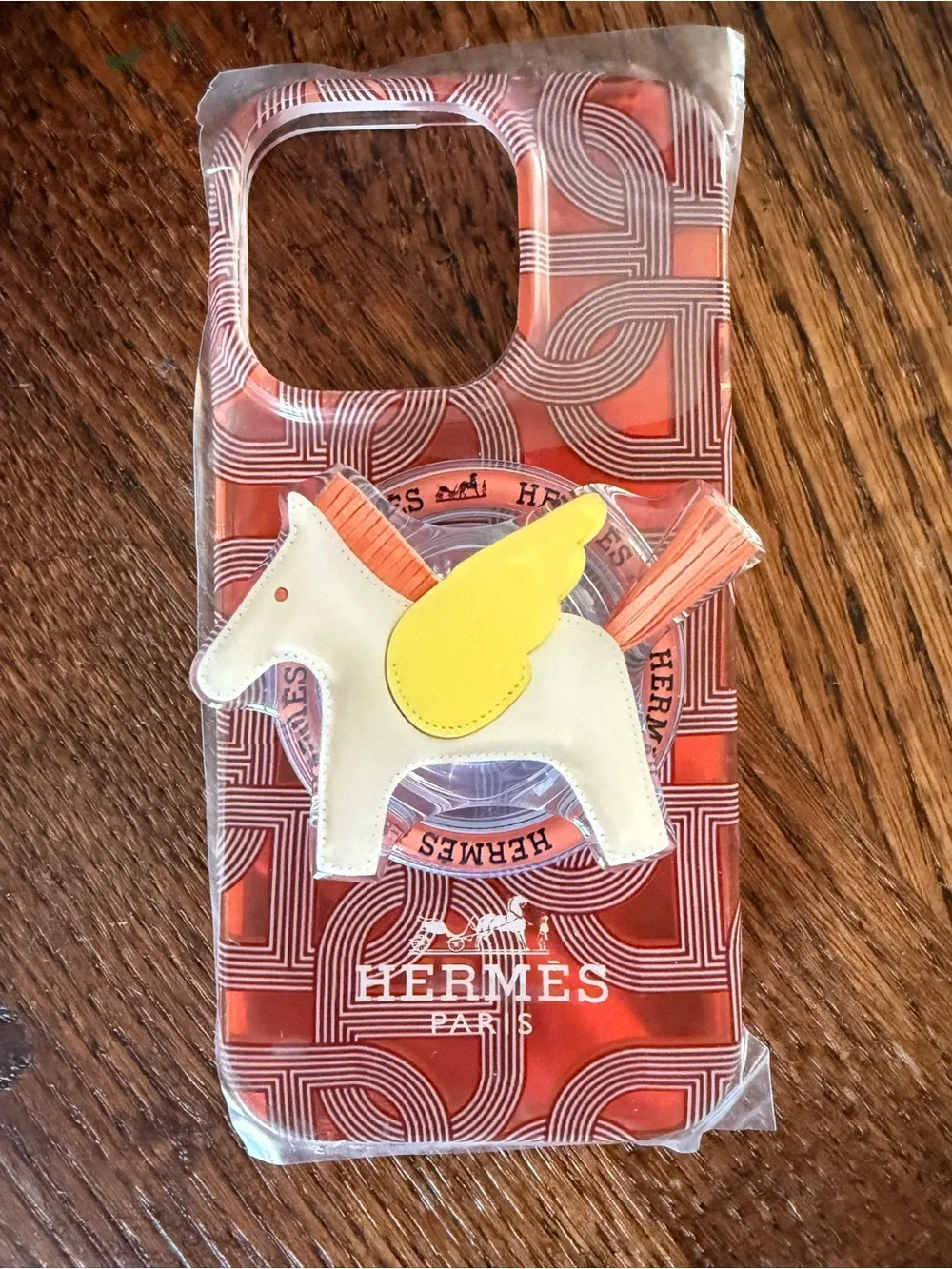 Hermes Orange & White Patterned Phone Case with Yellow Accent Charm